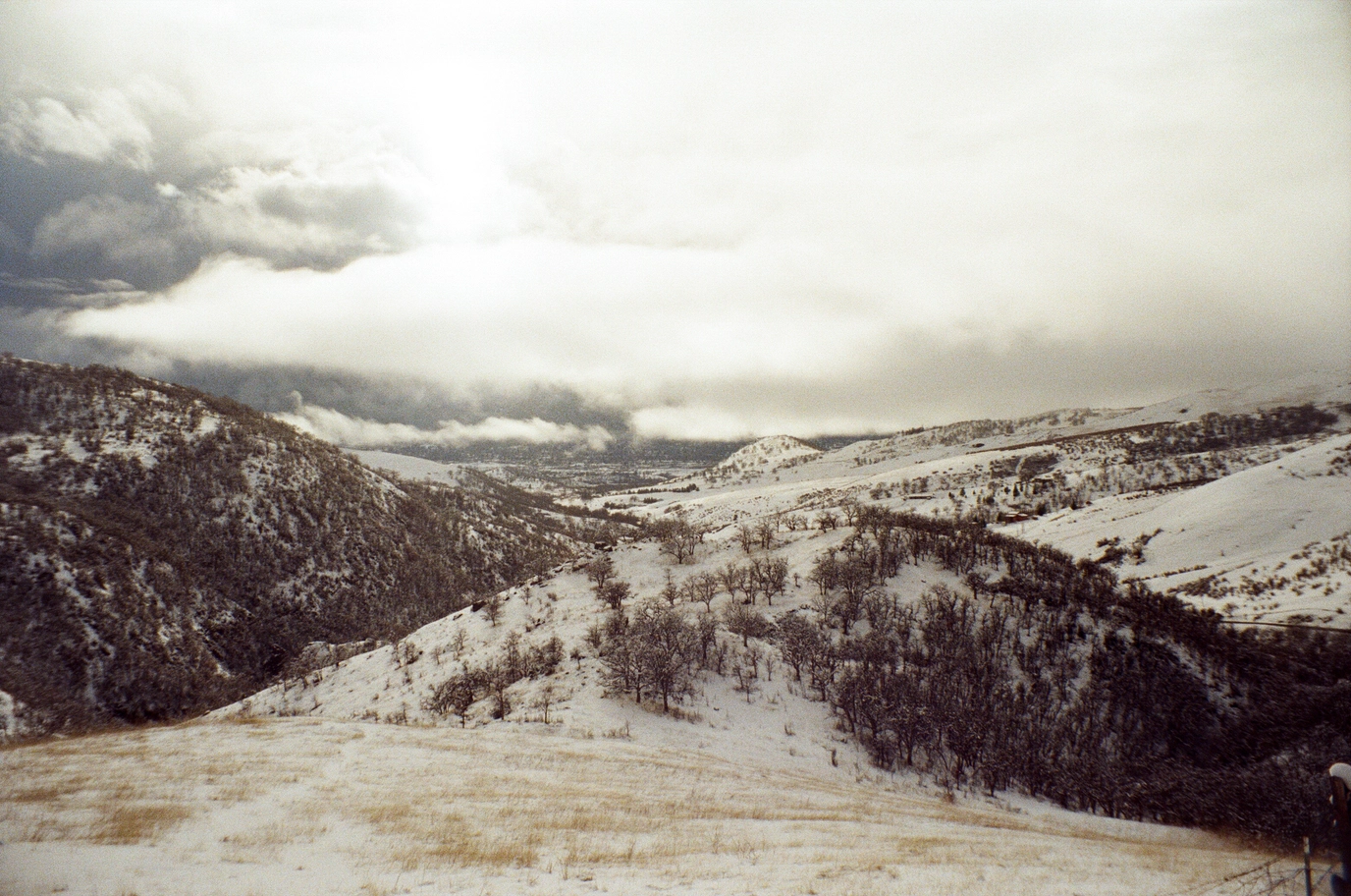 A photo of rogue valley on a snowy, cloudy day