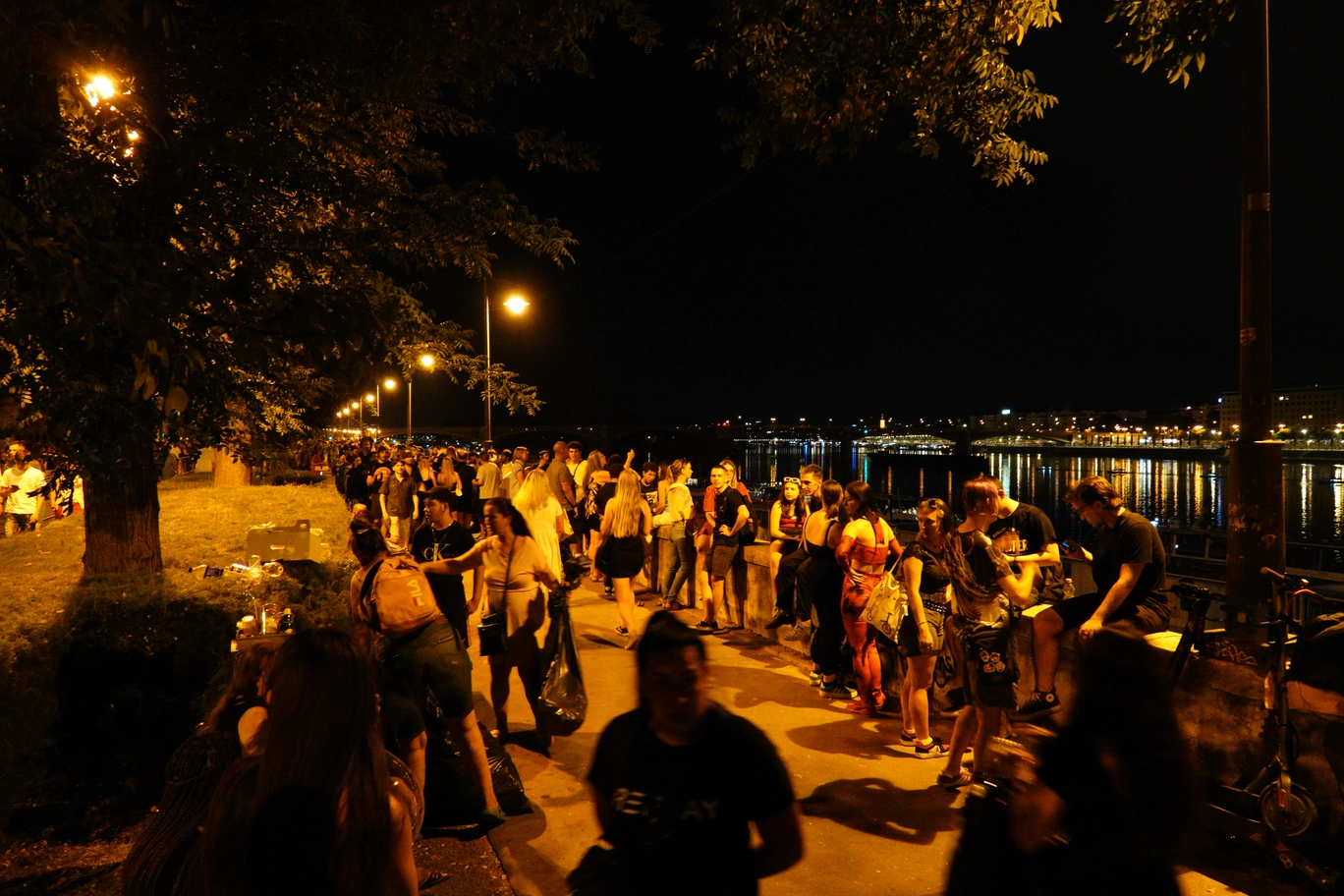 A photo of a crowd of people on the street