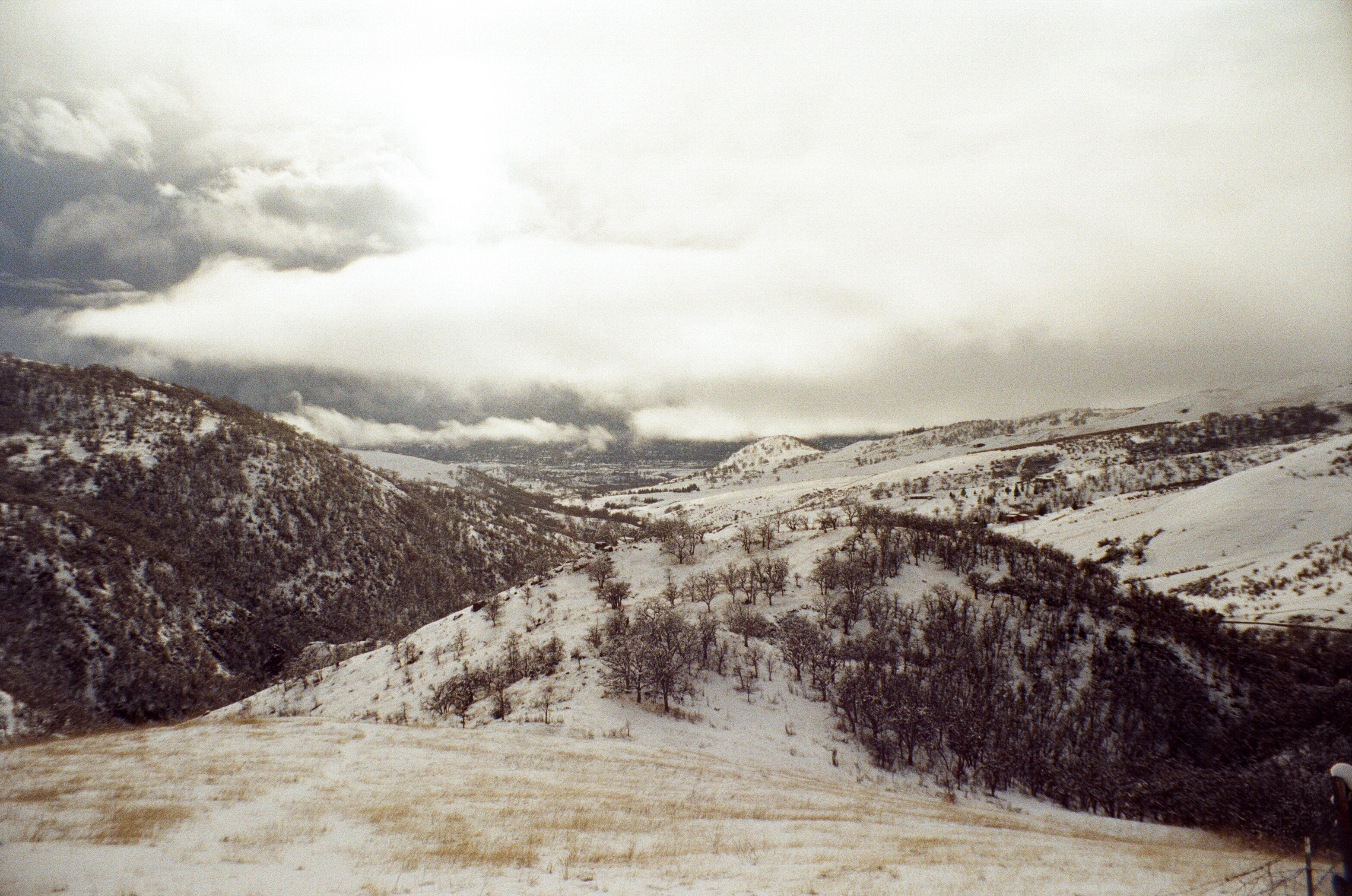 A photo of rogue valley on a snowy, cloudy day