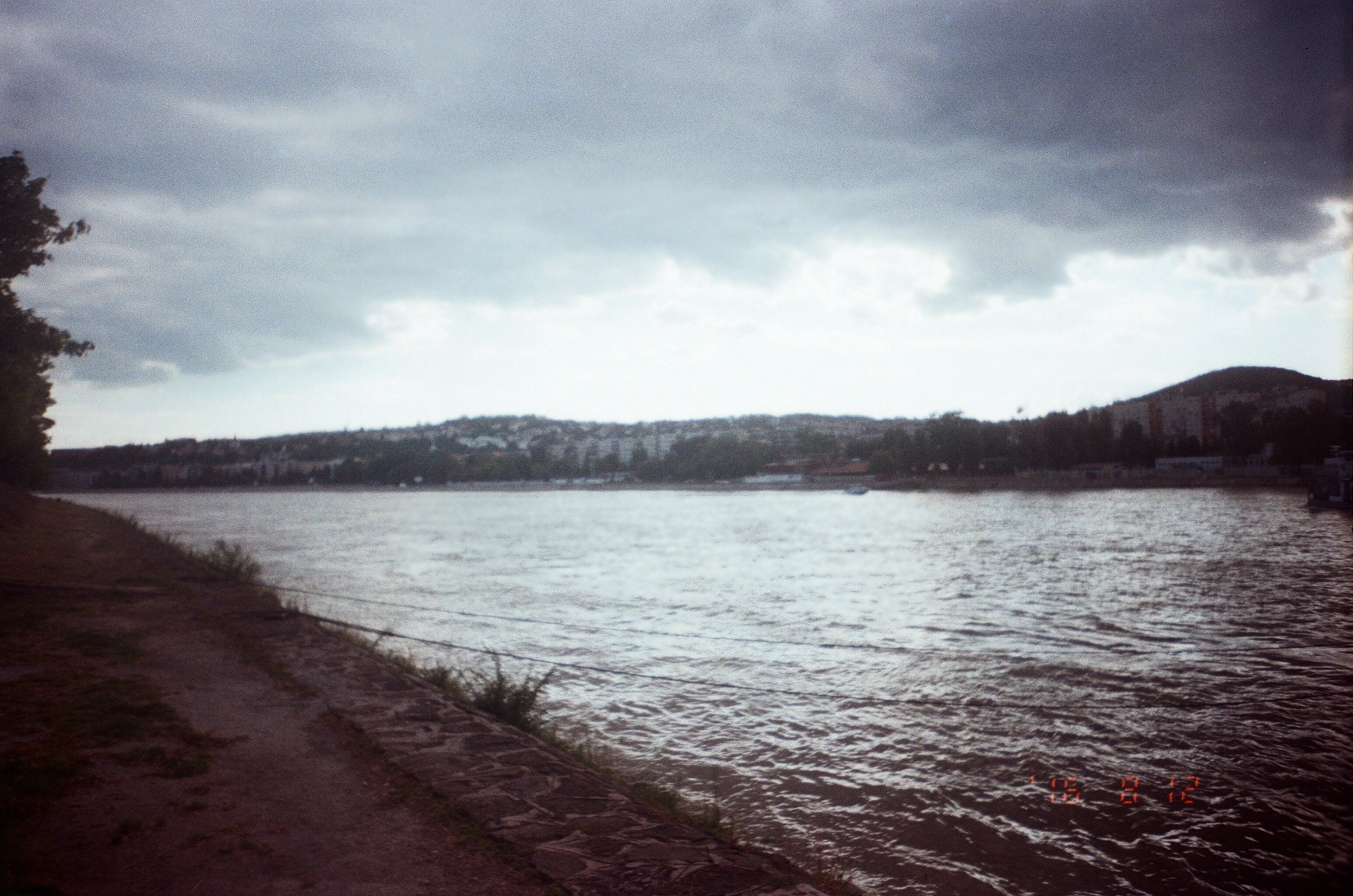 A photo of the Duna river during an overcast day