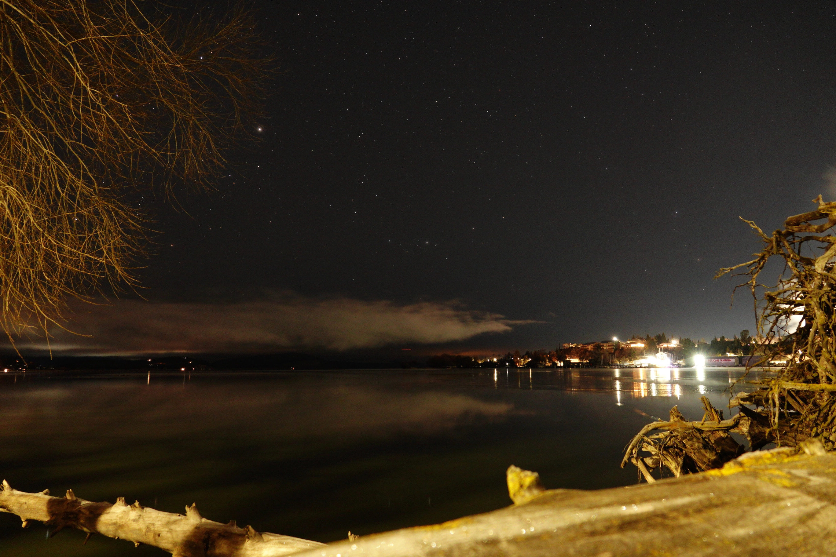 A photo of a lake at night