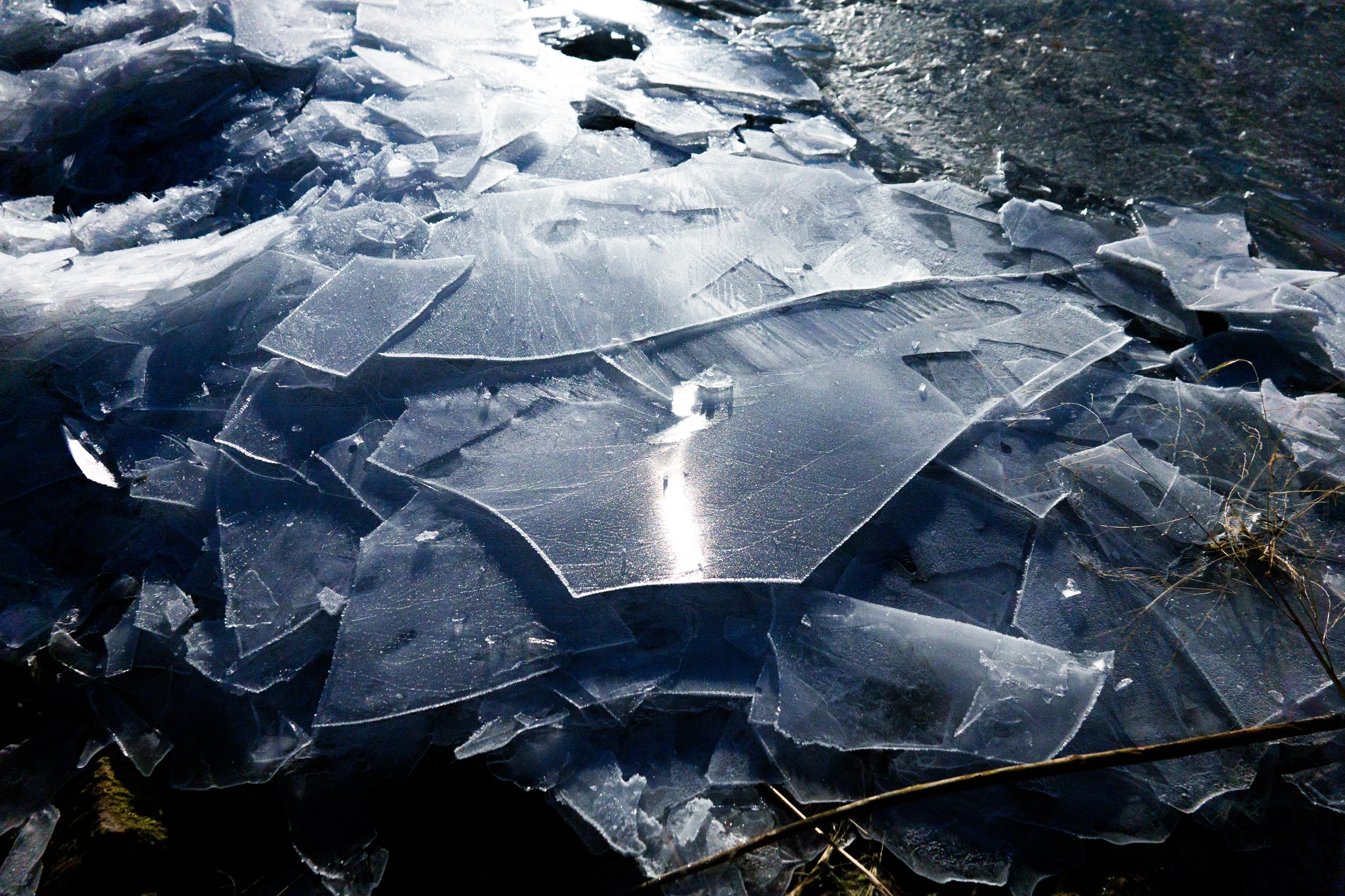 A photo of ice sheets under moonlight
